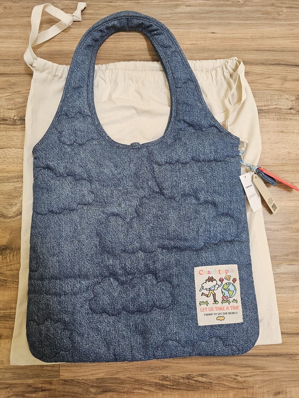 New Denim COACHTOΡΙΑ Flat Tote with Cloud Quilting